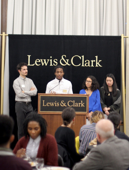 Symposium co-chairs (L)Alexander Castanes '18, Christen Cormer '18, Michelle Waters '19, and Gabriela Nakashima '18 welcome attendees at ...