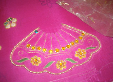This diety dress is an example of poshak needlework. (Photo courtesy of Food for Life Vrindavan)