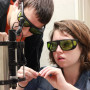 Reuben Peterson '14 and Amaya Lucas '15 conduct research with holographic optical tweezers.