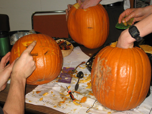 Messy process of carving pumpkins