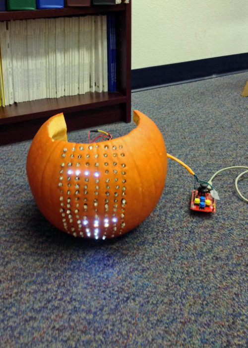 The 1st prize pumpkin is plugged into a computer, and displays a light show. We'd need a movie to see it at work.