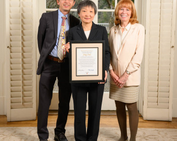 Ying Chen PhD '95, Distinguished Graduate standing with Jie Lian PhD '20 and Dean Jennifer Johnson