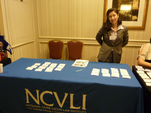 NCVLI pro bono attorney Jessica Perry staffs the registration table. - Photo by Susan Bexton