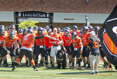 Players take the field before the game between the Lewis & Clark Pioneers and Claremont-Mudd-Scripps Stags, July 2, 2015, at Lewis 