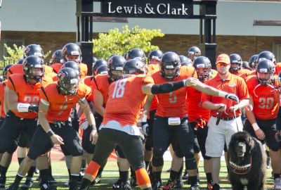 Players take the field before the game between the Lewis & Clark Pioneers and Claremont-Mudd-Scripps Stags, July 2, 2015, at Lewis 