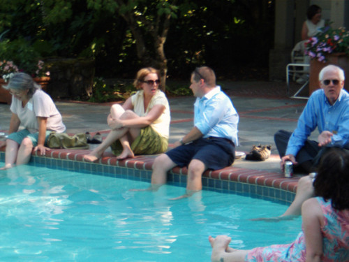 People beat the heat at the pool and enjoy an afternoon outside of the office