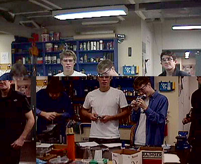 Students having fun in the shop, excited to make their hammers.