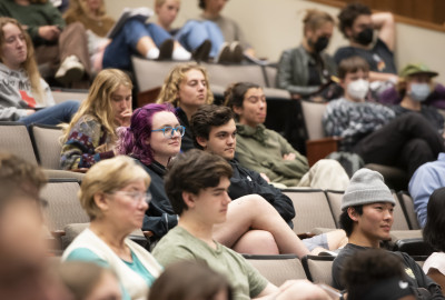 Students sitting in an auditorium.
