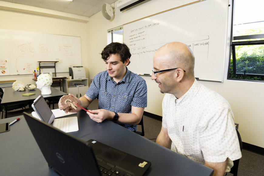 Associate Professor of Psychology Todd Watson collaborates with students to study cognitive contr...