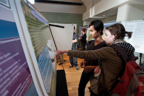 Beyond conducting research, we ask students to present their findings in poster sessions like this one.