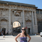 Kelly did some traveling (pictured in Zadar, Croatia) before settling into graduate school at Cla...