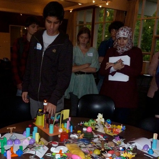 Students talk about their cities in the Build a City Workshop.  Photo by James Rojas.