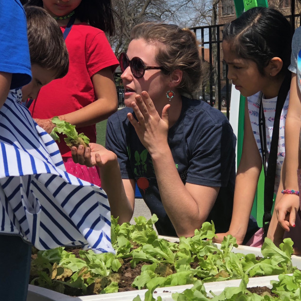 Katherine Jernigan working with students in a school garden in Chicago.