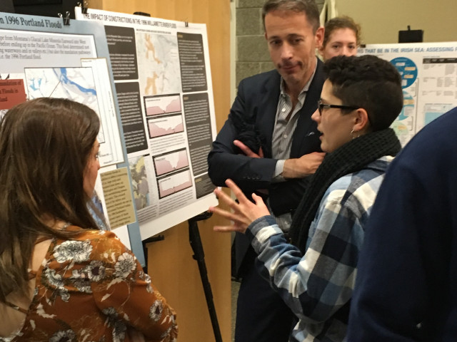 CAS Dean Bruce Suttmeier talks with Climate Science students at the Fall 2018 Poster Celebration.