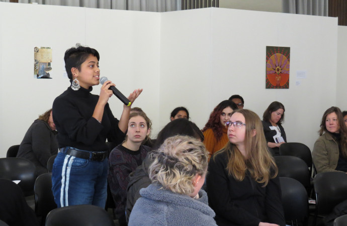 Arumina Jamwal '21 asks a question during the Cultural Traditions and Healing Practices panel