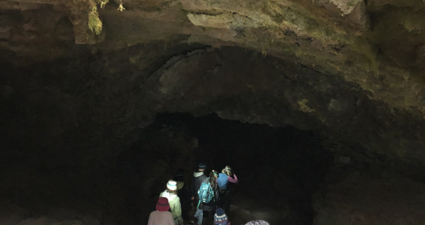 students descending into the Ape Caves