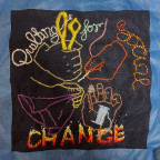 Quilt square by Mary Andrus reads: Quilting for Social Change