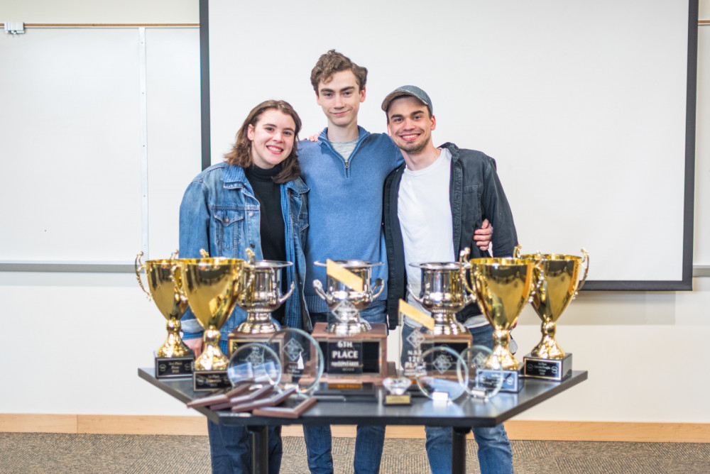 Speech and debate squad members Hope Smothers BA '22, Alex Webb BA '22, and Aaron Lutz BA '22Cred...