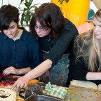 Cara Tomlinson, associate professor of art, works with students