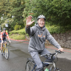 Wim Wiewel leads a community bike ride on his first day as president.