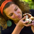 Lily Clarke examines some of the mushrooms she studies.