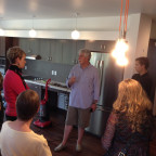 Michel George, associate vice president for facilities, leads a tour of the remodeled Juniper res...