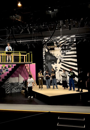 Students rehearsing for the main stage production of RENT.