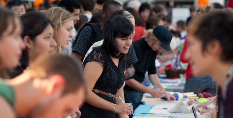 Students sign up for campus activities during the annual Pio Fair.