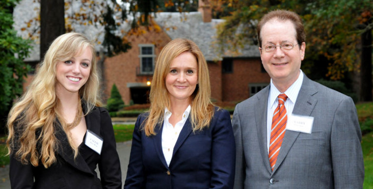 Samantha Bee, center, poses with President Barry Glassner and student government President Callie Rice.