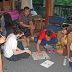 Professor Peter D., our gaming master, shows some students how to play one of his many games.