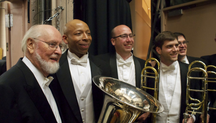 JáTtik Clark, Instructor of Tuba and Euphonium, gathers with other musicians